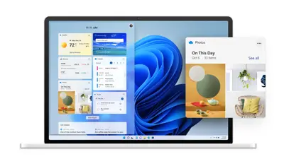 En bärbar dator visar Windows 11 med widgets som väder, kalender och "On This Day"-foton.